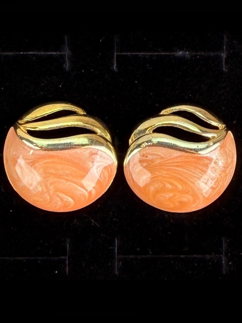 Beautiful goldtone with peach enamel swirl pierced earrings